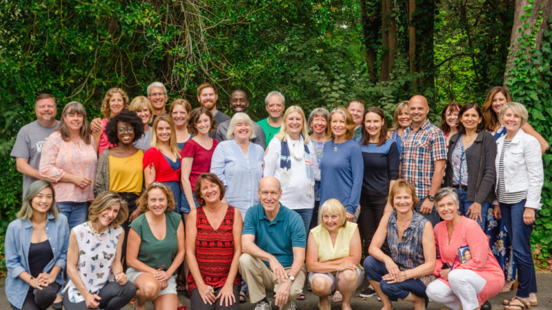 A large group of Enneagram participants gathers together