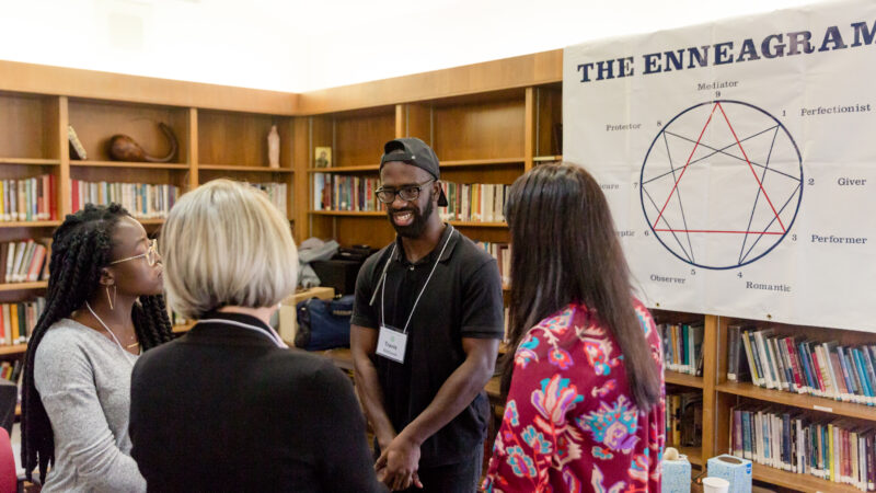 A group of students at a live Enneagram course
