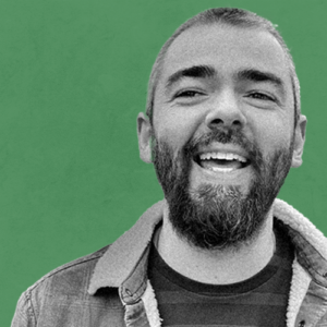 A black and white photo of Logan Jones on a green background
